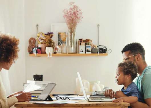 mother-father-and-son-on-computer-at-table
