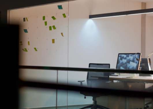 Image of an office with a computer on