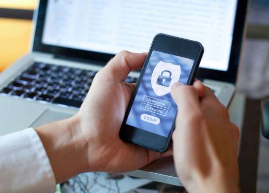 A person logging into a secure app on their phone