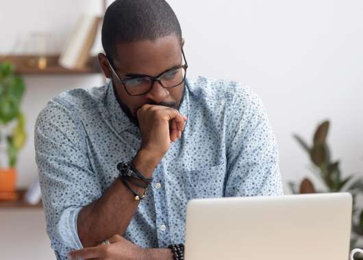 distressed-man-on-laptop